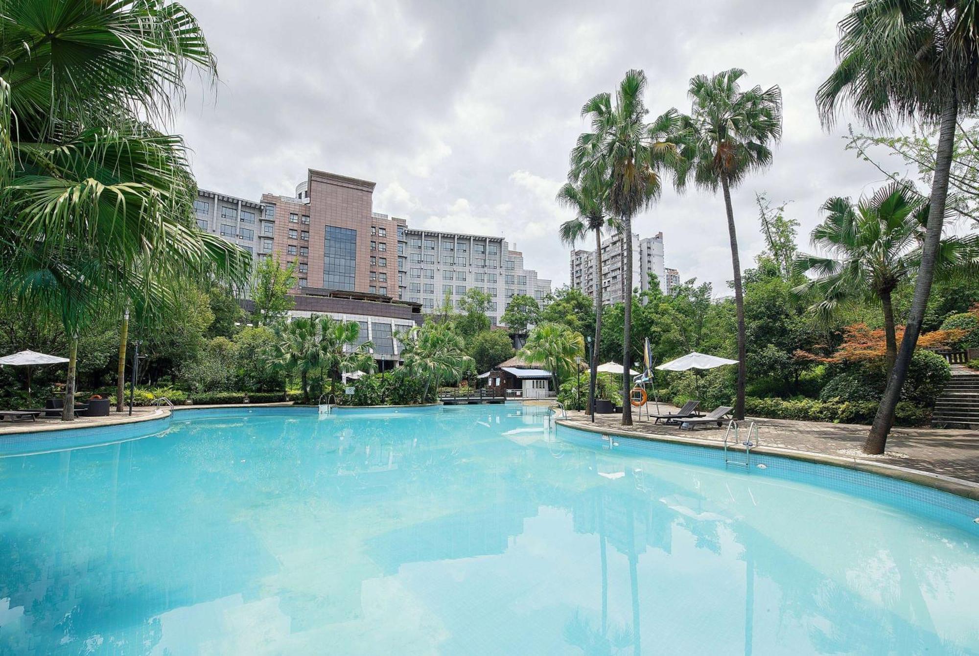 Отель Ramada Plaza By Wyndham Chongqing West Экстерьер фото
