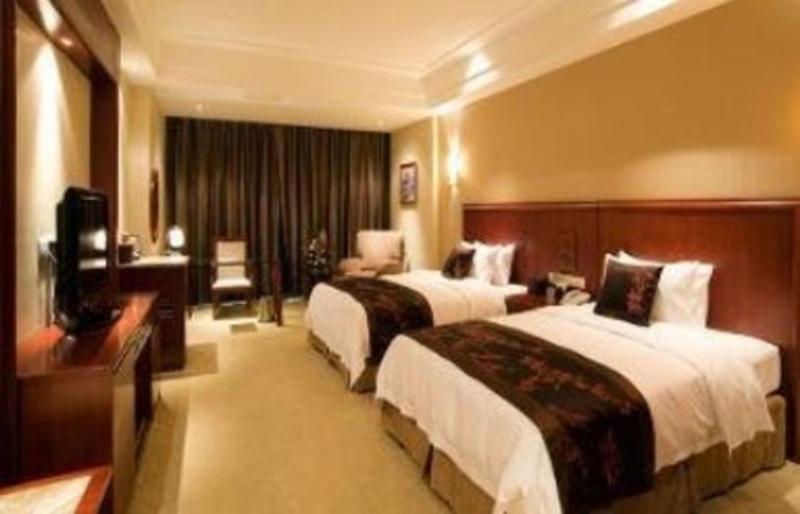 Отель Ramada Plaza By Wyndham Chongqing West Экстерьер фото
