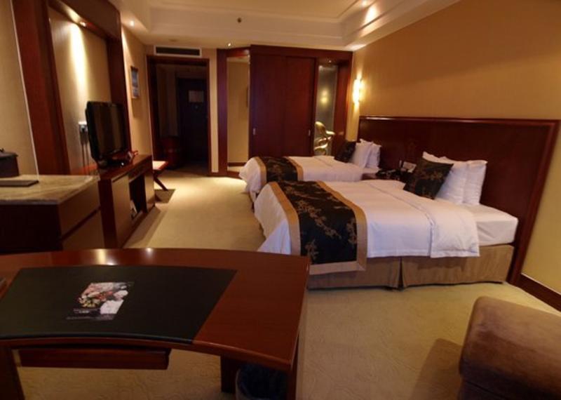 Отель Ramada Plaza By Wyndham Chongqing West Экстерьер фото